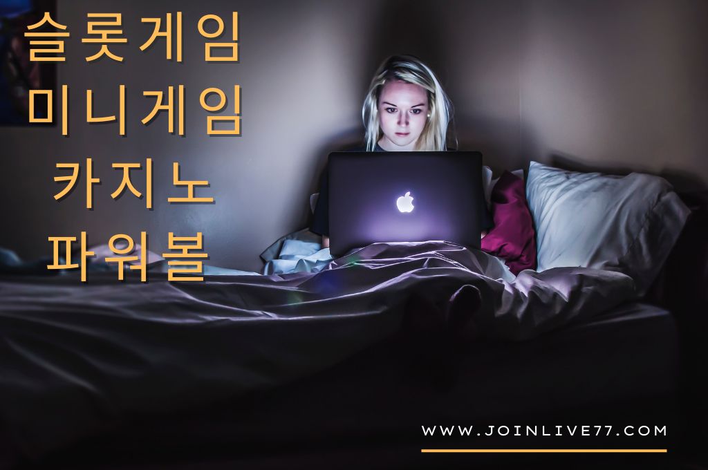 Beautiful girl focus on her laptop to play online gambling in her room.