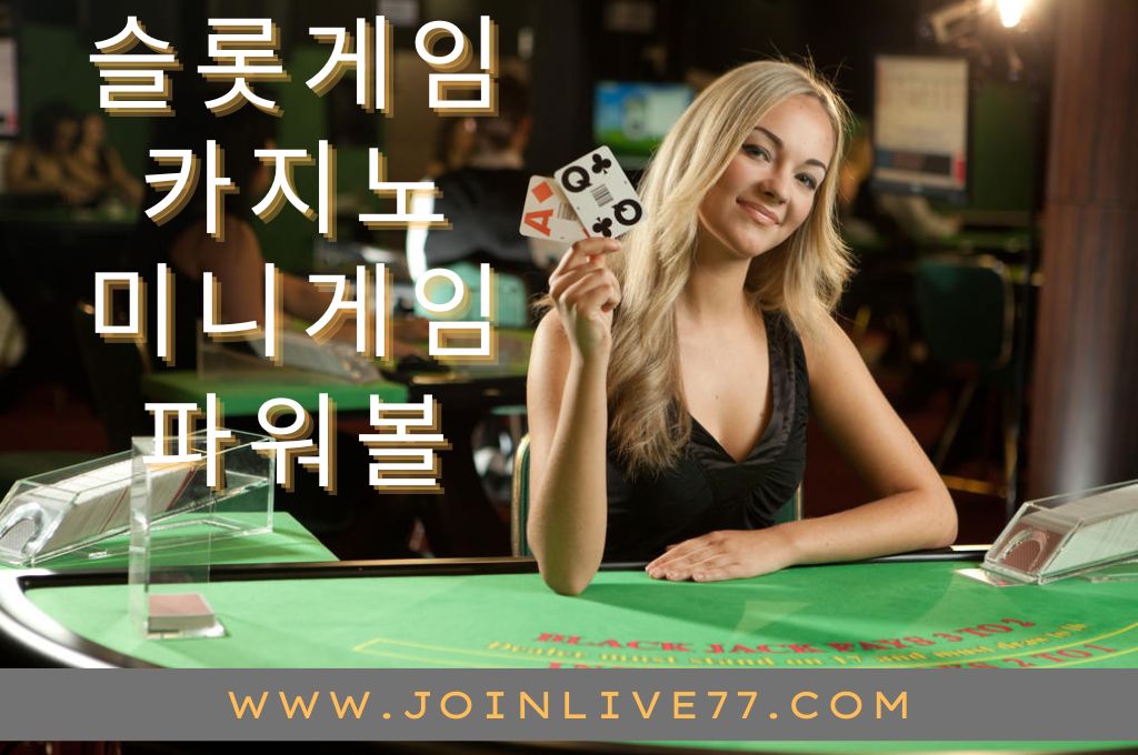 Beautiful casino dealer sitting behind the blackjack table while holding two cards
